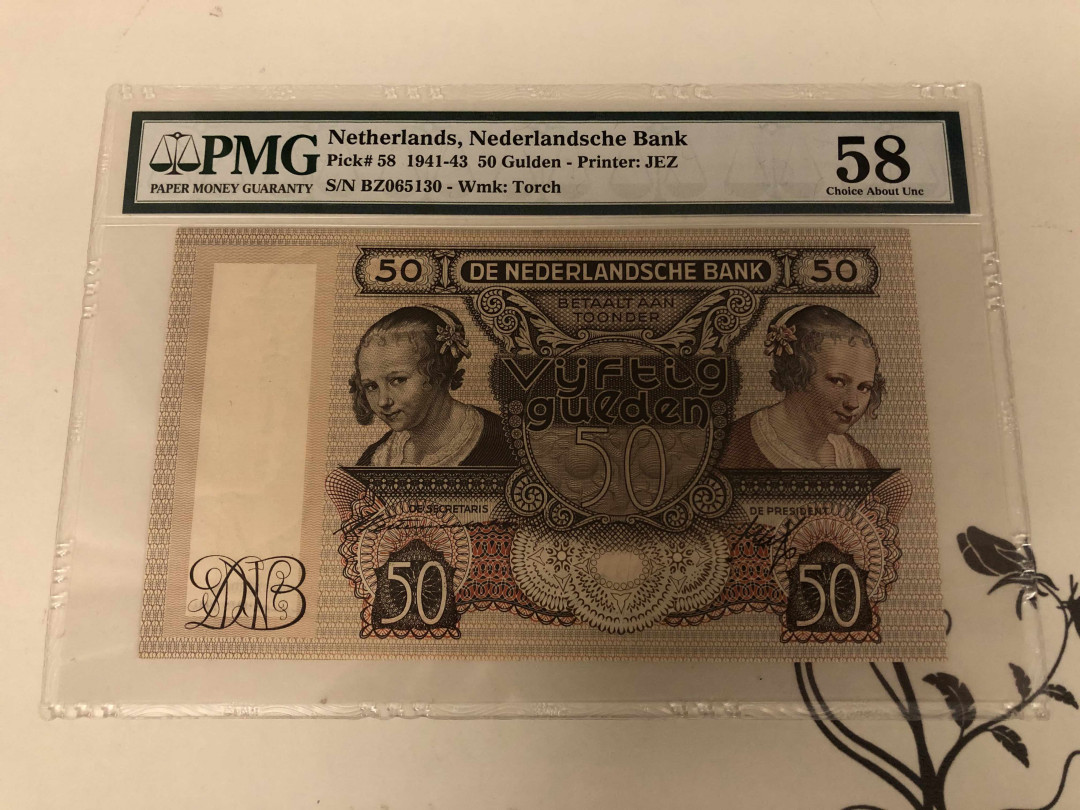【收藏联盟】第146期拍卖——北非后花园（共50拍） 荷兰 1941-43年50盾 PMG58 吃牡蛎的小女孩