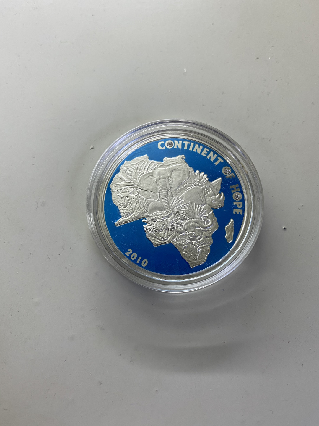 CSIS-GREAT评级精品钱币拍卖第四十一期 科特迪瓦2010年希望的大陆精制彩色高浮雕镶嵌水晶精制纪念银币