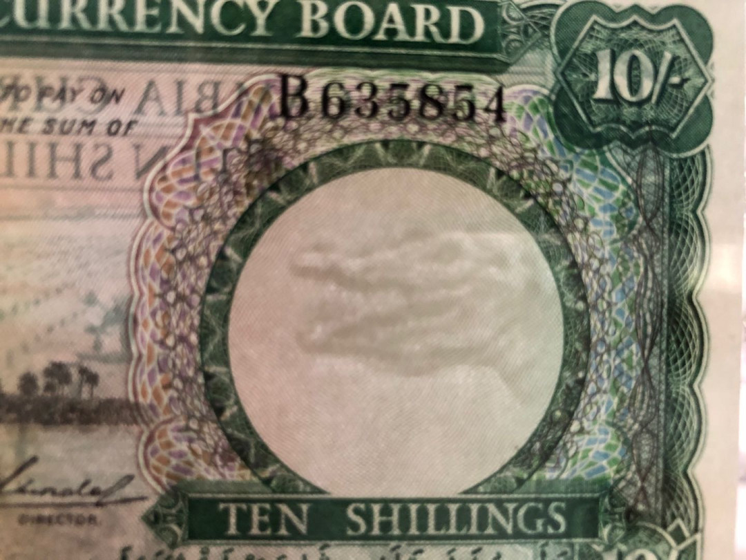 【收藏联盟】第148期拍卖——港澳风云（共55拍） 【该国第一张纸币】冈比亚 1965-70年 10先令 p1a 双面雕刻 非常漂亮