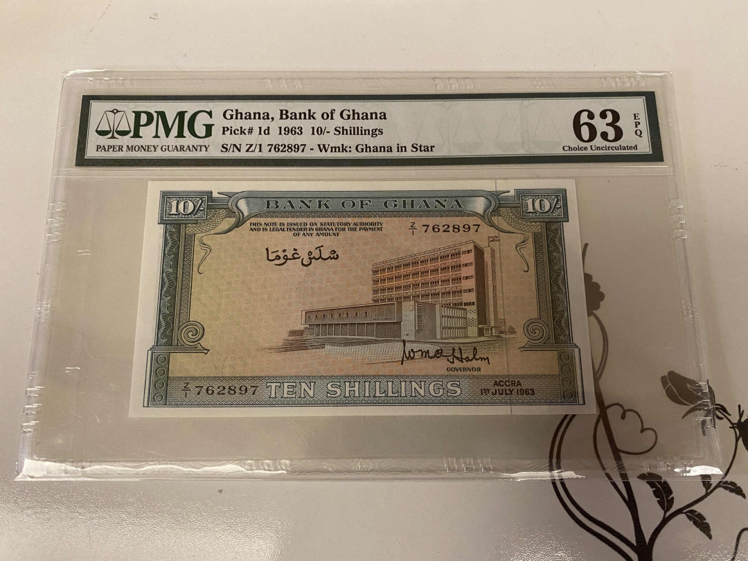 【收藏联盟】第148期拍卖——港澳风云（共55拍） 【该国第一张纸币】 加纳 1963年 10先令 PMG63EPQ  p1d