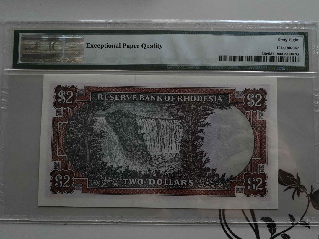 【收藏联盟】第148期拍卖——港澳风云（共55拍） 罗德西亚 1977年2元 PMG68EPQ