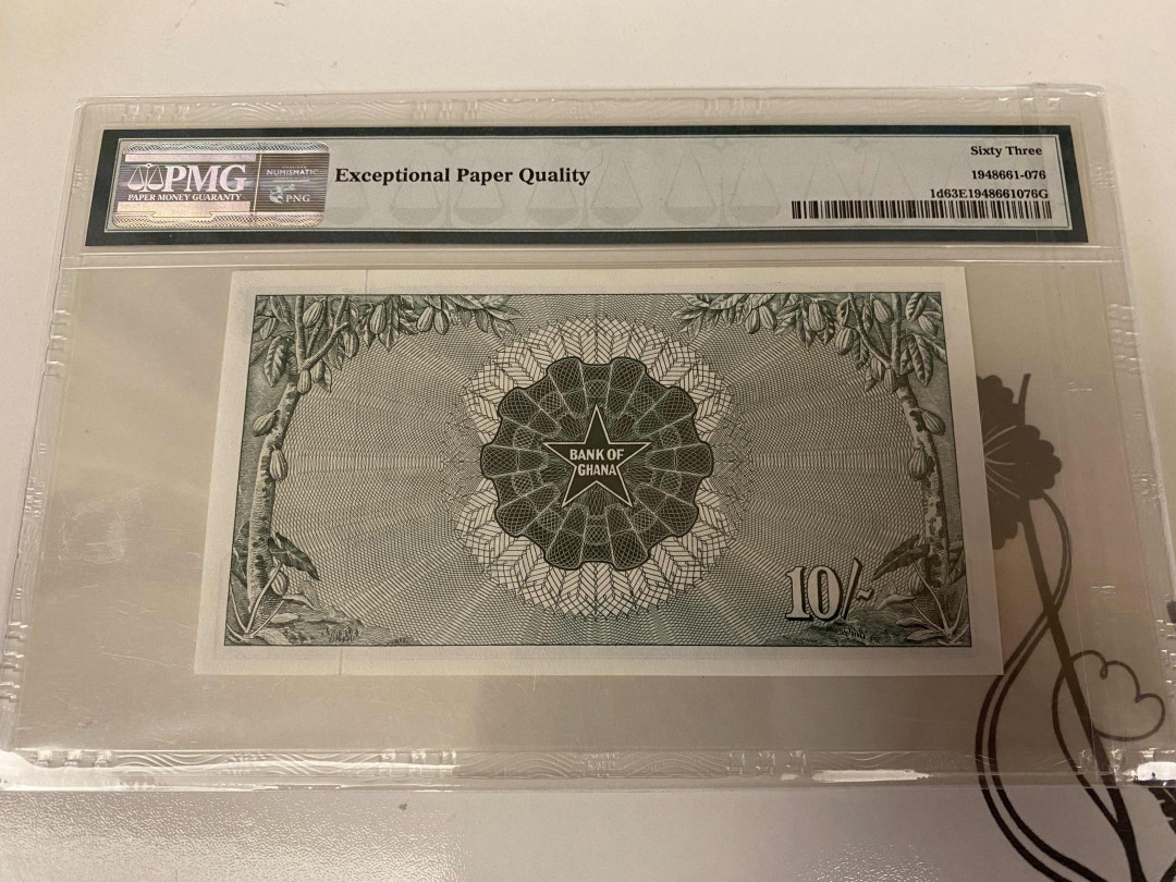 【收藏联盟】第148期拍卖——港澳风云（共55拍） 【该国第一张纸币】 加纳 1963年 10先令 PMG63EPQ  p1d