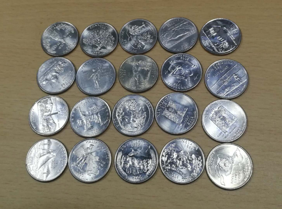 北京马甸外币专卖第十二期拍卖，非贵金属硬币专场。陆续上新，欢迎关注 美国25分纪念币20枚不同全新，品相如图