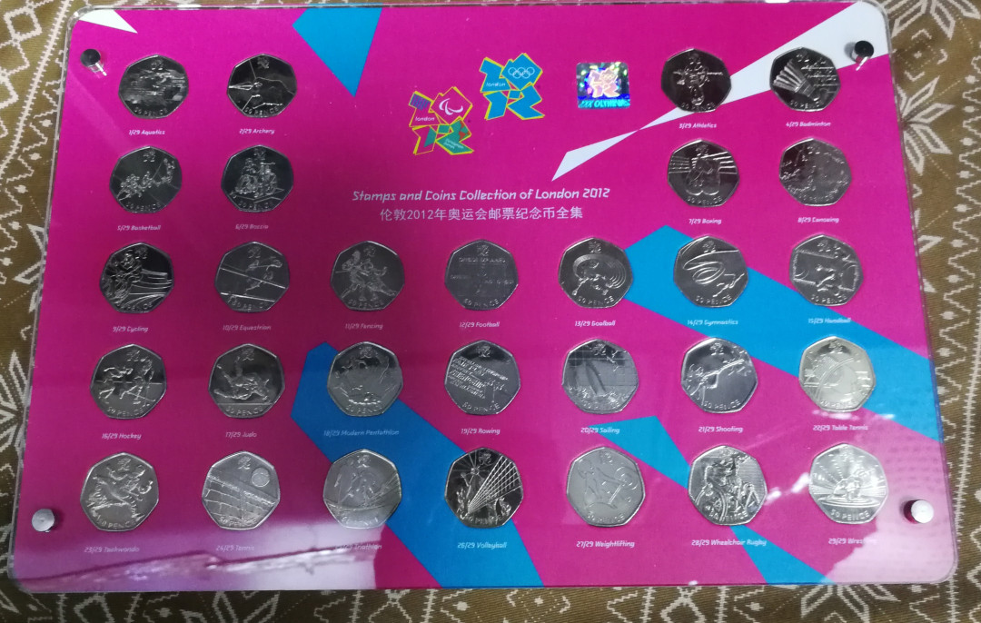 北京马甸外币专卖第十二期拍卖，非贵金属硬币专场。陆续上新，欢迎关注 2012年英国伦敦奥运会29枚纪念币全套。品相如图，亚克力包装