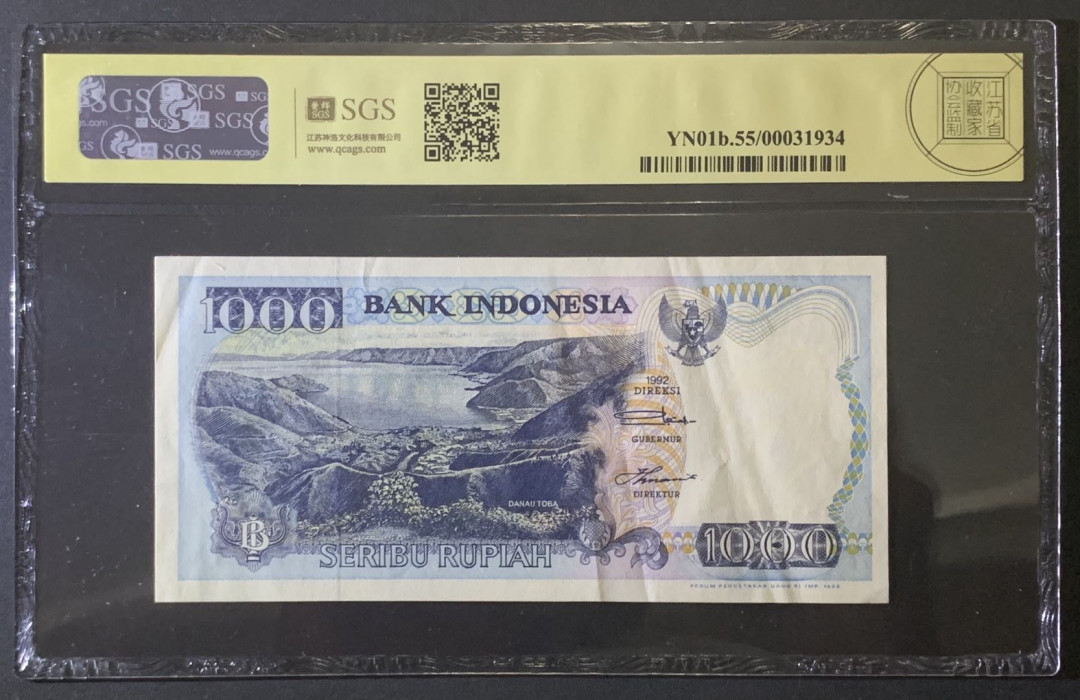 紫瑗钱币—微拍第81期—纸币场 印度尼西亚 1992年  多巴湖风光 1000卢比 美评 SGS 55