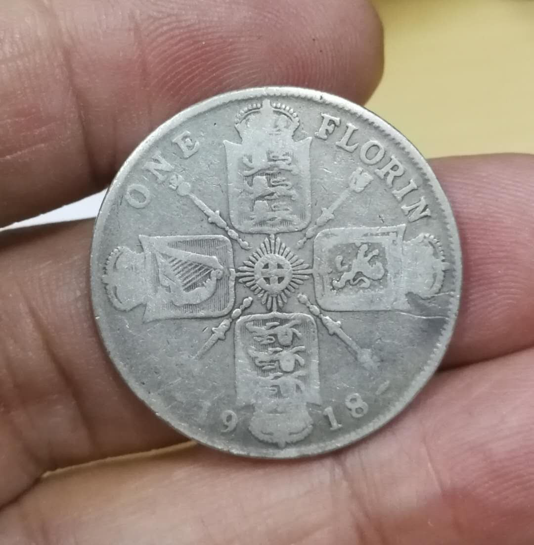 北京马甸外币专卖拍卖第十三期，陆续上新欢迎关注 1919年英国乔五银币，重11.31克，925银，品相如图