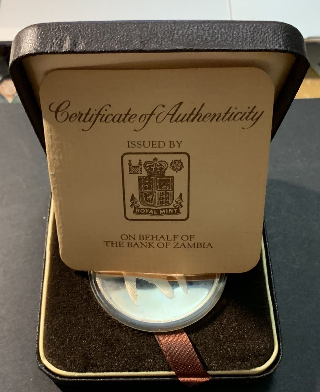 紫瑗钱币—微拍第85期  赞比亚 1979年 泰塔猎鹰 10夸查 35克 0.925银 精制 原盒证书