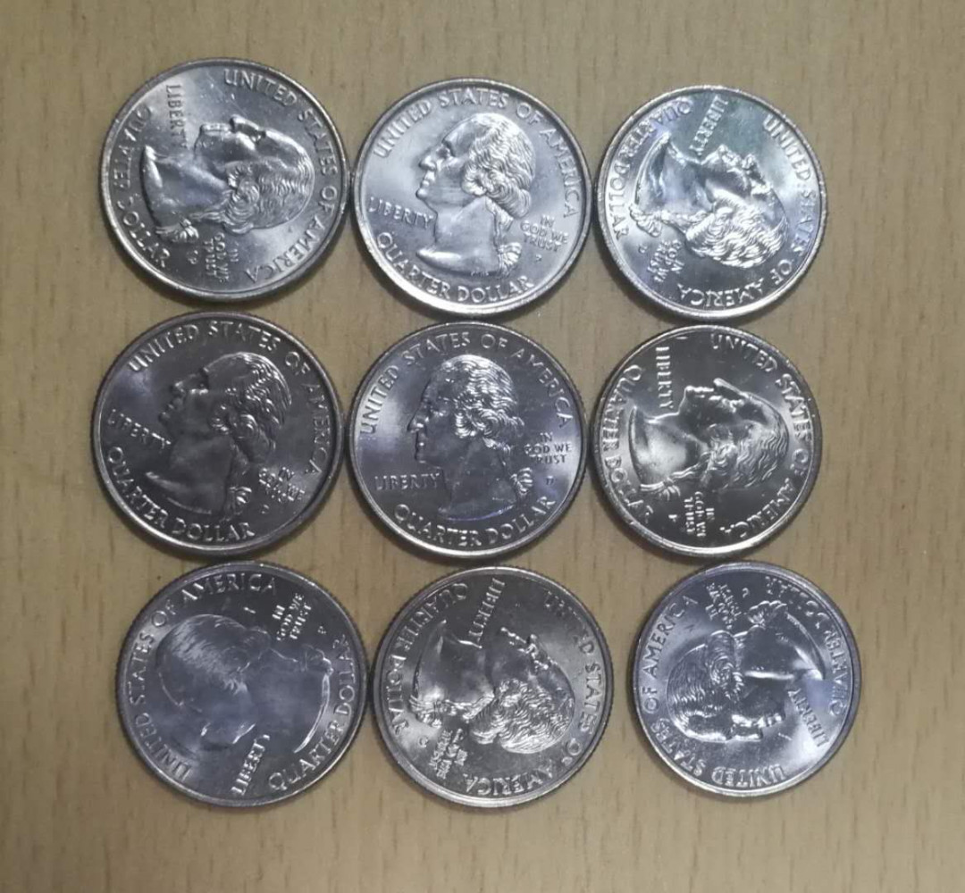 北京马甸外币专卖拍卖第十四期，非贵金属硬币专场，陆续上新，欢迎关注 美国25美分纪念币9枚，品相如图全新未流通