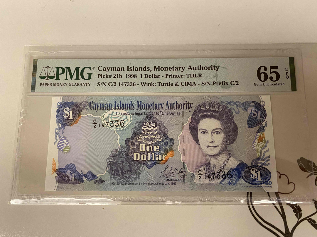 【收藏联盟】第154期拍卖——大津巴布韦遗址（共50拍） 开曼 1998年1元 PMG65EPQ 女王纸币
