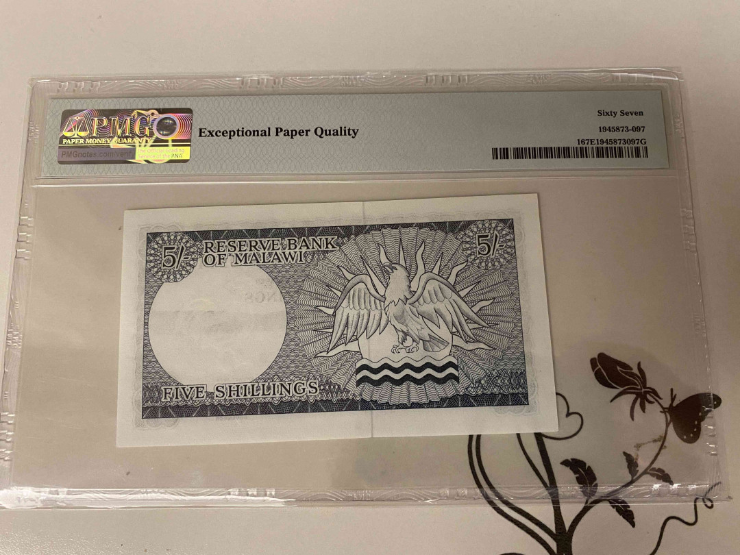 【收藏联盟】第154期拍卖——大津巴布韦遗址（共50拍） 【该国第一张纸币】马拉维 1964年 5先令 PMG67EPQ 高分 p1