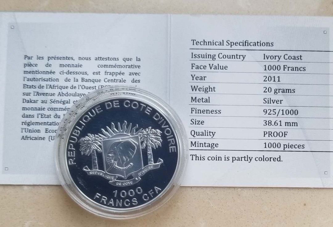 【币观天下】第114期钱币拍卖 科特迪瓦2011年剑齿虎彩色银币 