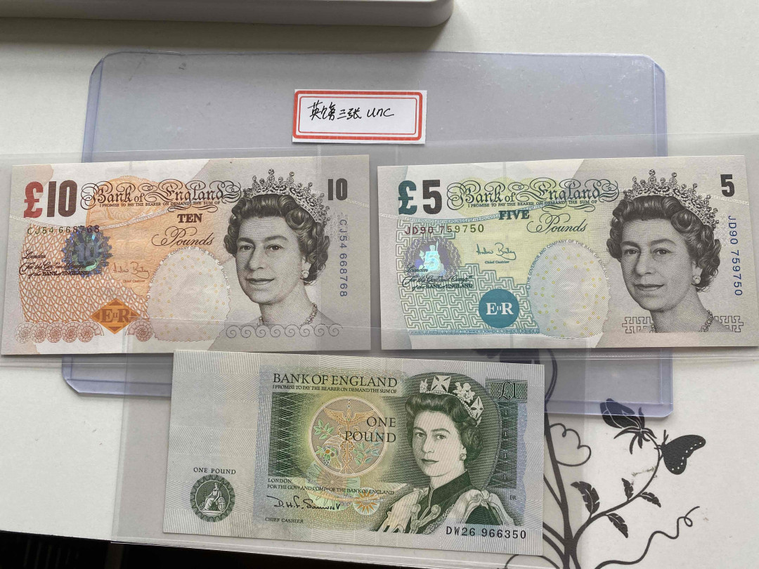 【收藏联盟】第154期拍卖——大津巴布韦遗址（共50拍） 【一组3张】英国 D序列、E序列 1-5-10镑 5，10镑全新UNC，1镑UNC-