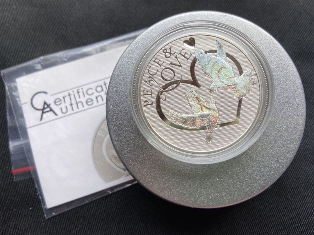 【币观天下】第114期钱币拍卖 托克劳2012年5新西兰元，“和平与爱-心形鸽子”激光全息幻彩 浮雕精制纪念银币