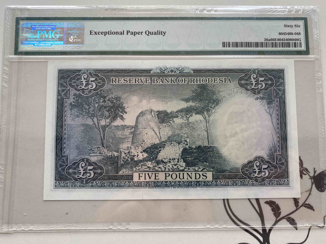 【收藏联盟】第154期拍卖——大津巴布韦遗址（共50拍） 罗德西亚 1964年 5镑无47 PMG66EPQ  p26a 戎装女王 大津巴布韦遗址 BWC出品