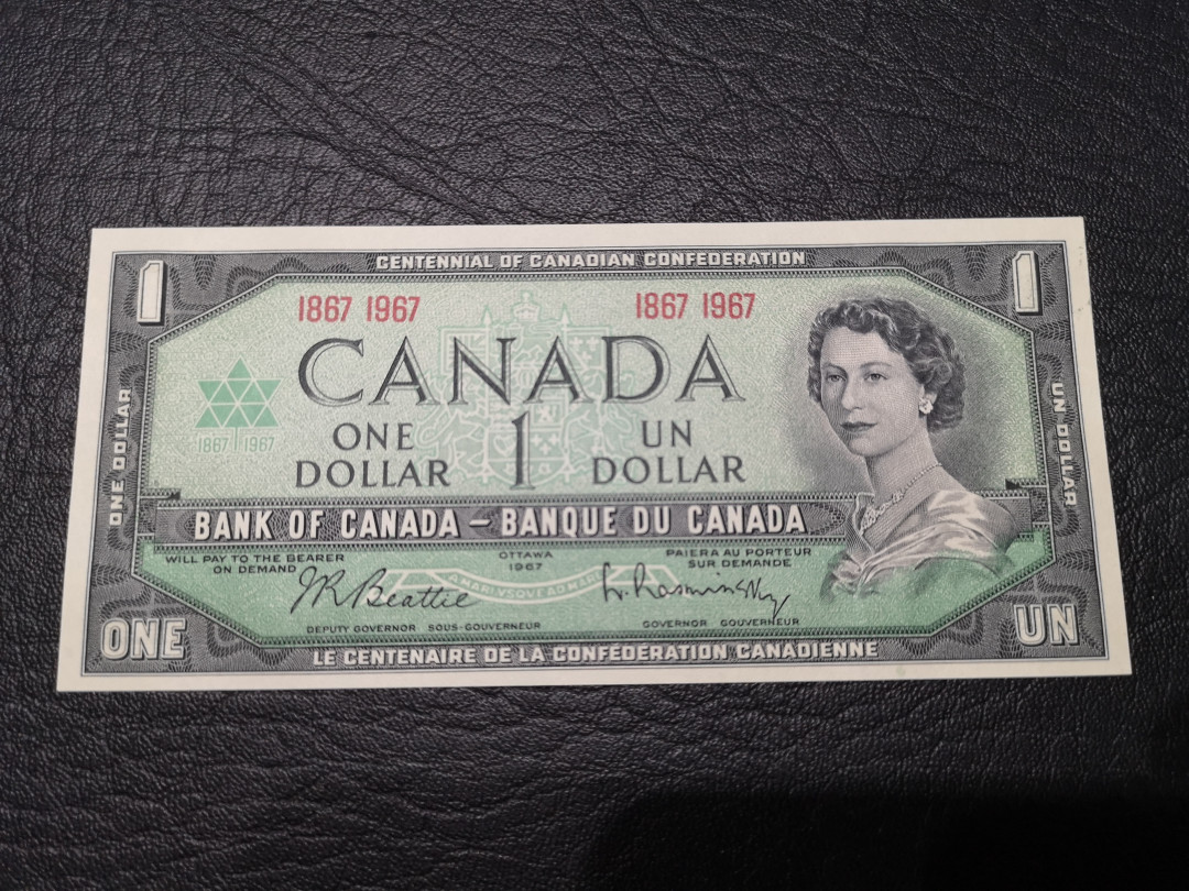 《外钞收藏家》第八十一期拍卖 加拿大1加元 100周年纪念钞 非常精美  全新unc
