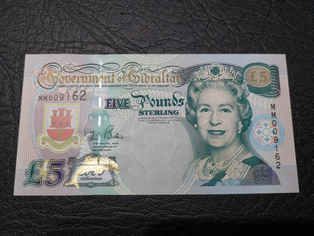 《外钞收藏家》第八十一期拍卖 直布罗陀5镑 千位号 全新unc