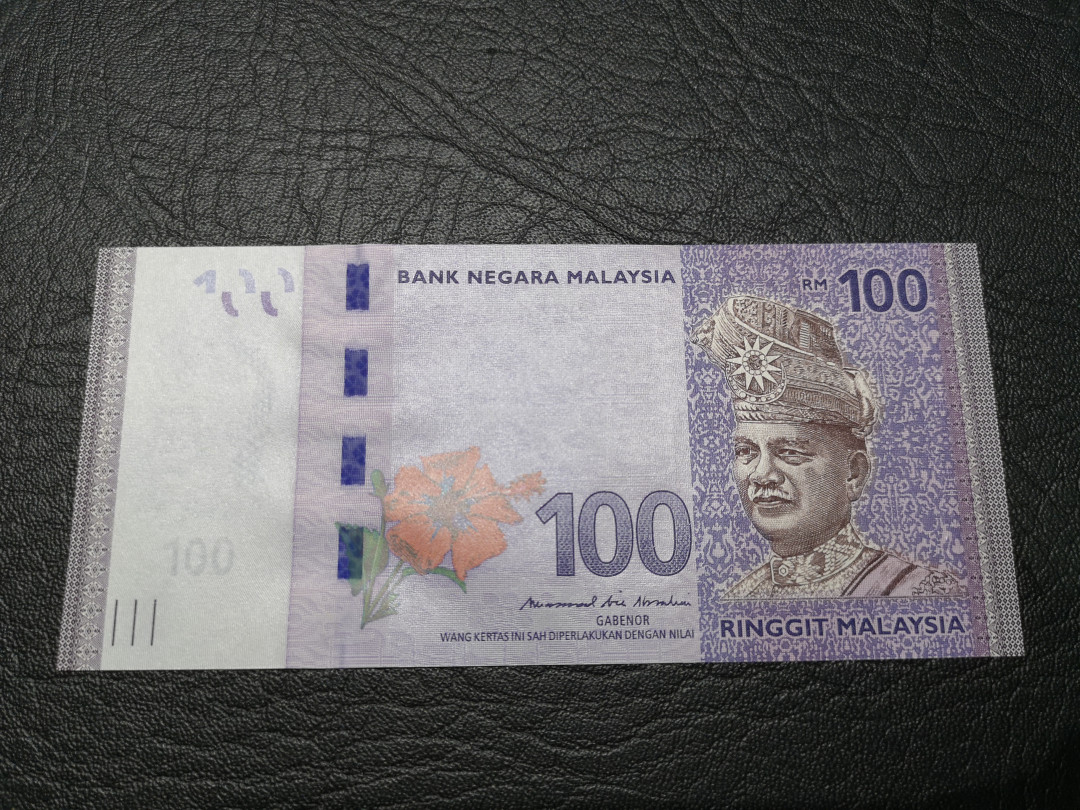 《外钞收藏家》第八十一期拍卖 马来西亚流通版100林吉特  全新unc 