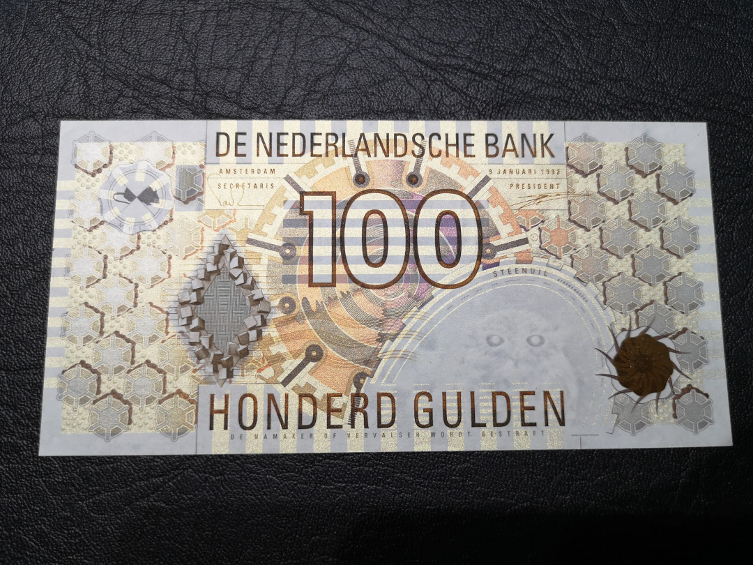 《外钞收藏家》第八十一期拍卖 荷兰齿轮版100  全新unc