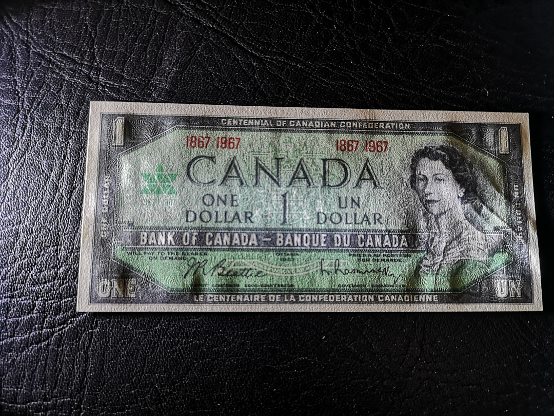 《外钞收藏家》第八十一期拍卖 加拿大1加元 100周年纪念钞 非常精美  全新unc