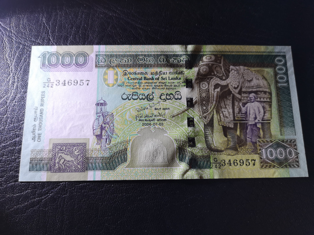 《外钞收藏家》第八十一期拍卖 斯里兰卡2006年1000  孔雀钞 全新unc