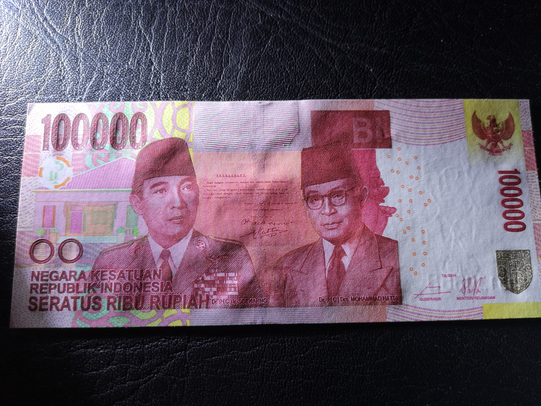 《外钞收藏家》第八十一期拍卖 2014年印尼100000卢比  全新unc