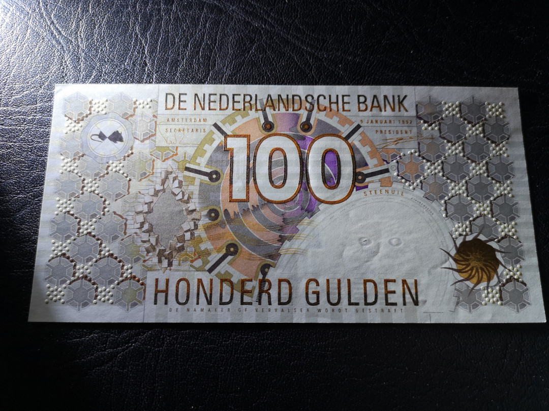 《外钞收藏家》第八十一期拍卖 荷兰齿轮版100  全新unc