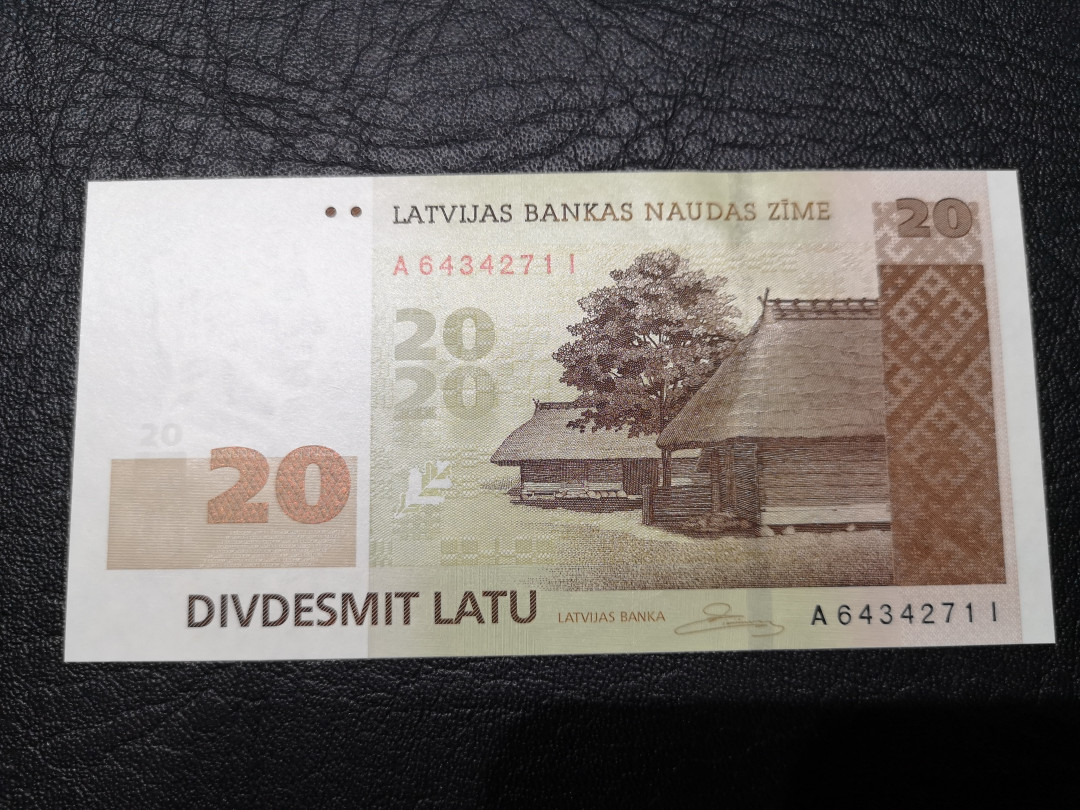 《外钞收藏家》第八十一期拍卖 拉脱维亚2009年20  A冠 非常精美的小票 全新unc