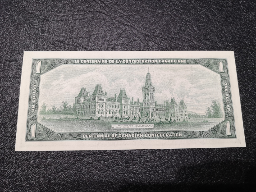 《外钞收藏家》第八十一期拍卖 加拿大1加元 100周年纪念钞 非常精美  全新unc