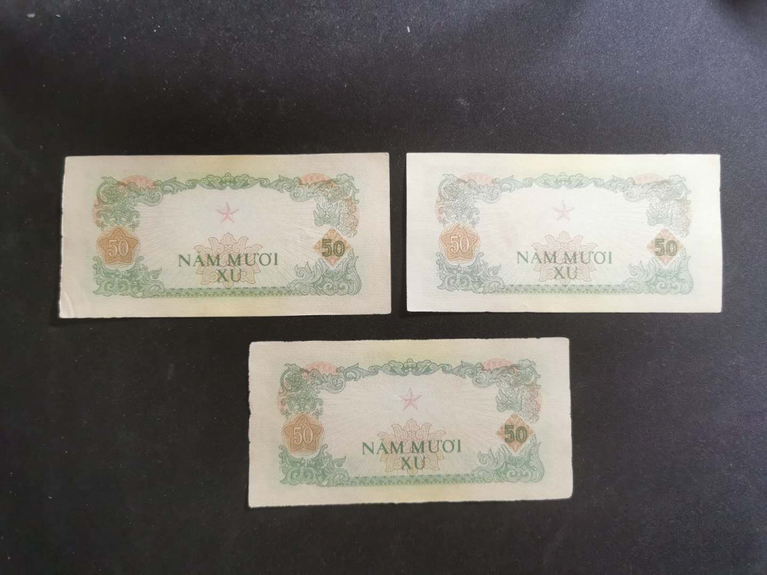 【鲸贝乐淘】千字文·第“存以甘棠，去而益咏”号拍卖 【越南🇻🇳 】中国代印，南方民族解放战线50XU纸币三张，品相一般
