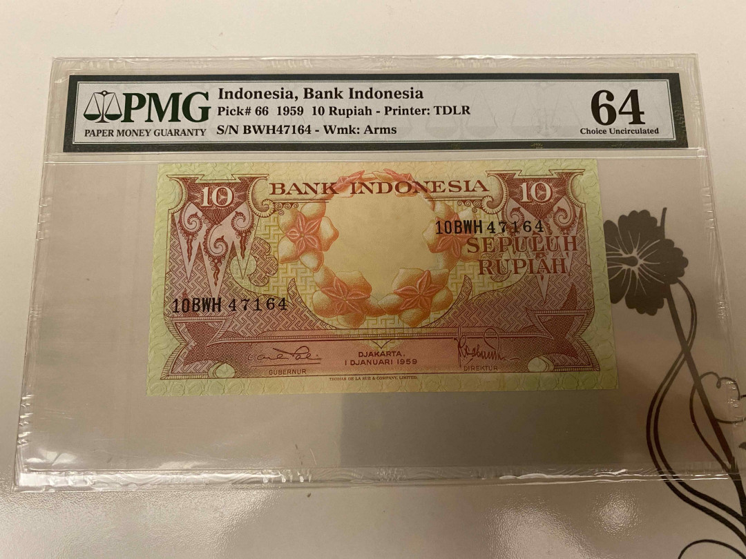 【收藏联盟】第155期拍卖——日本的释迦摩尼（共45拍） 印尼 1959年10卢比 PMG64 花鸟版
