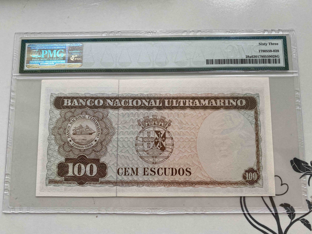 【收藏联盟】第156期拍卖（共50拍） 1963年 东帝汶 100埃斯库多 PMG 63  555290