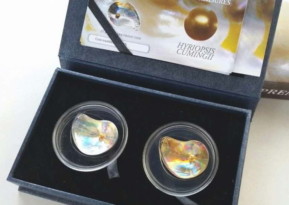 【随心拍&Getcoins】现代钱币拍卖第六十一期 帕劳2014年“玉蚌含珠”三角帆蚌镶嵌银币两枚