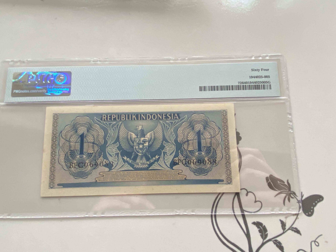 【收藏联盟】第158期拍卖——五个波斯人（共55拍） 印尼1954年1卢比 PMG 64 BFC069083