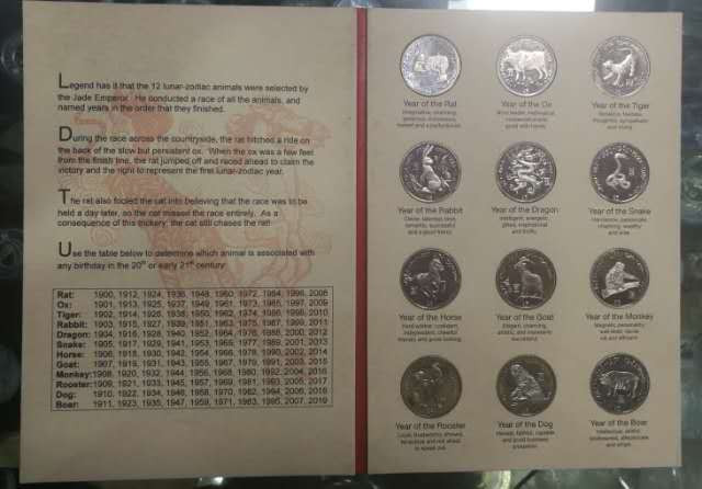 北京马甸外币专卖拍卖第十七期，非贵金属专场，陆续上新欢迎关注 2000年利比里亚发行中国12生肖纪念币册，品相如图