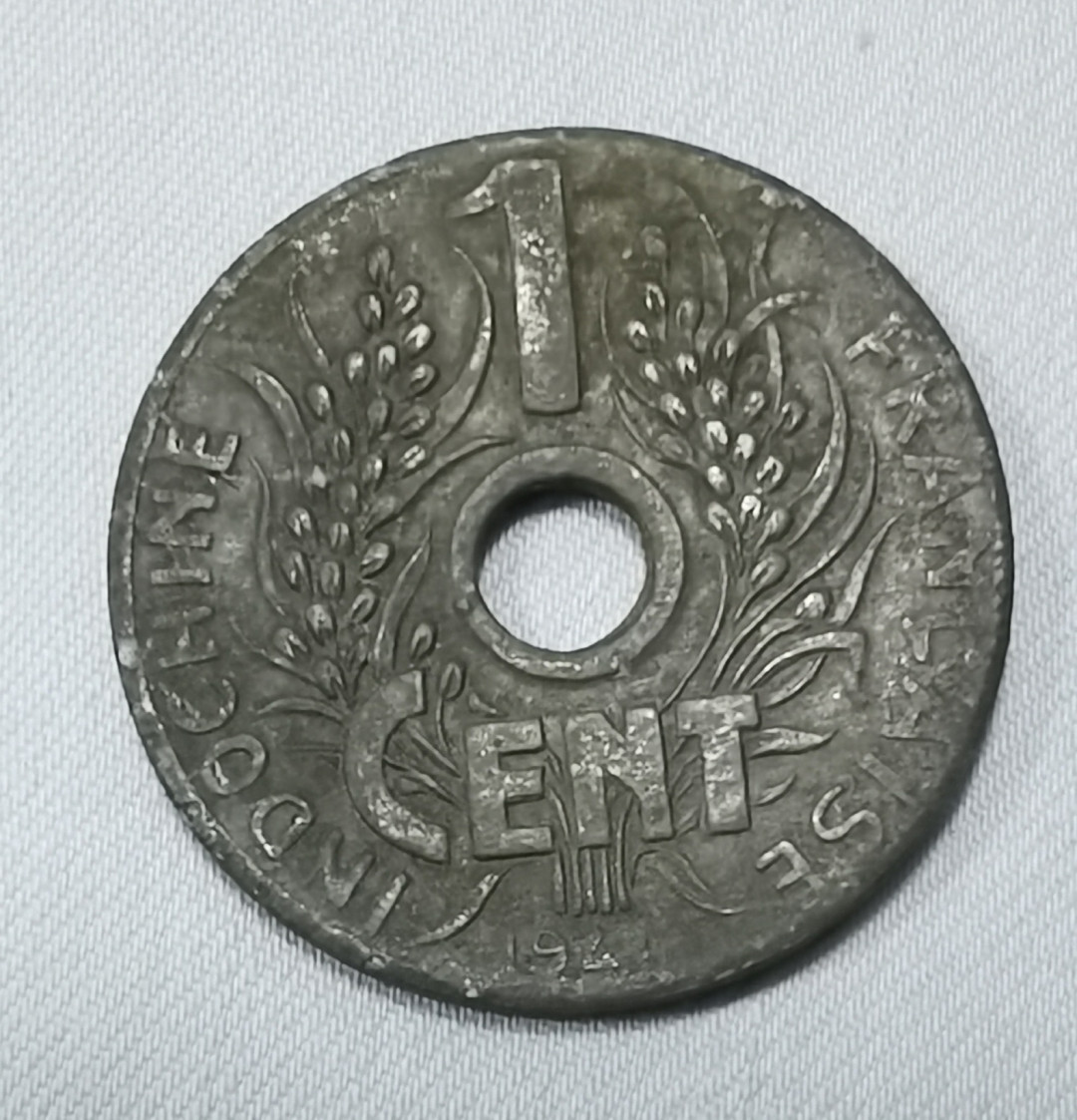 北京马甸外币专卖拍卖第十七期，非贵金属专场，陆续上新欢迎关注 1941年法属印度支那铅锌币，品相如图