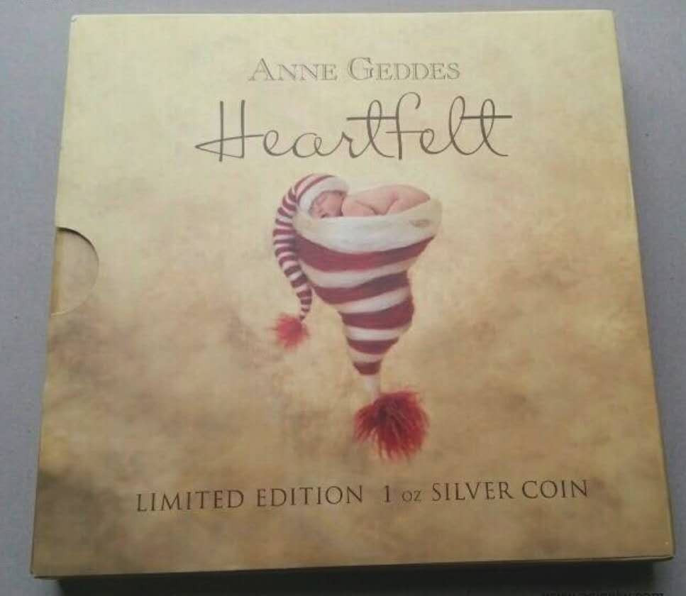 【币观天下】第117期钱币拍卖 纽埃2014年安妮格蒂斯宝贝摄影银币 