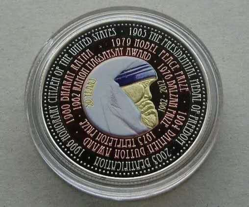 【币观天下】第117期钱币拍卖 发行777枚的喀麦隆特蕾莎修女三色合金夹心镶嵌币