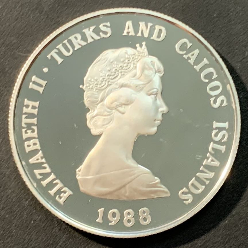 紫瑗钱币—微拍第96期  特克斯与凯恩斯 1988年 WWF基金会25周年  特克斯巨蜥 1克朗 28.28克 0.925银 精制 