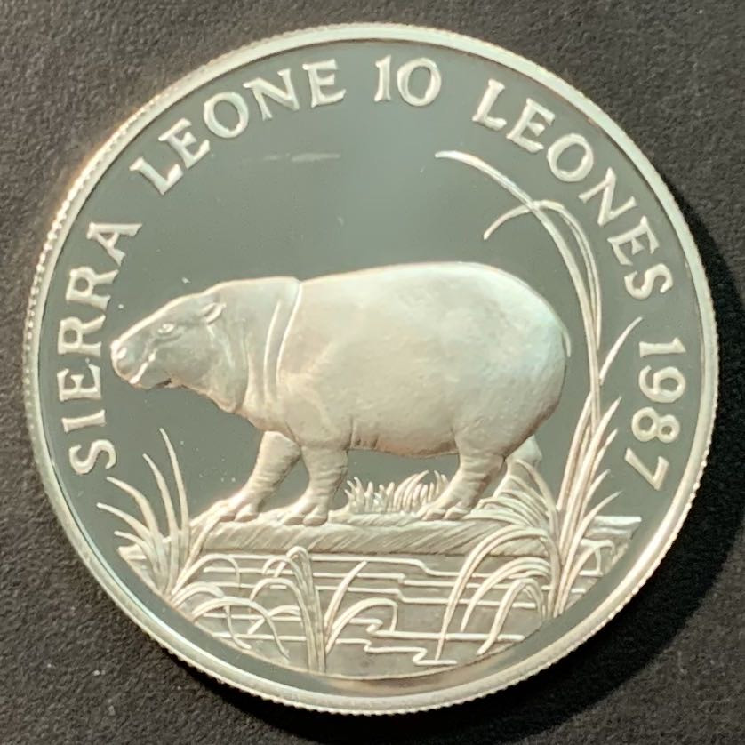 紫瑗钱币—微拍第96期  塞拉利昂 1987年  WWF基金会25周年 侏儒河马 10利昂 28.28克 0.925银 精制