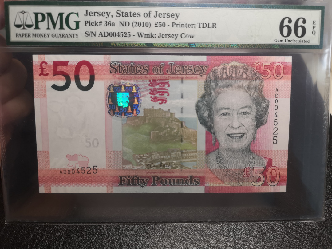 《外钞收藏家》第八十二期拍卖 泽西2010年50镑4525千位号 pmg66