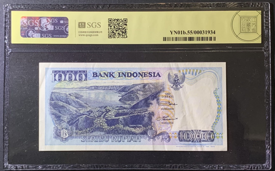 紫瑗钱币——微拍第99期—纸币场 印度尼西亚 1992年  多巴湖 1000卢比 美评 SGS 55