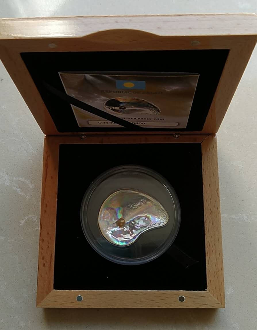 【币观天下】第118期钱币拍卖 帕劳2014年玉蚌含珠幻彩银币