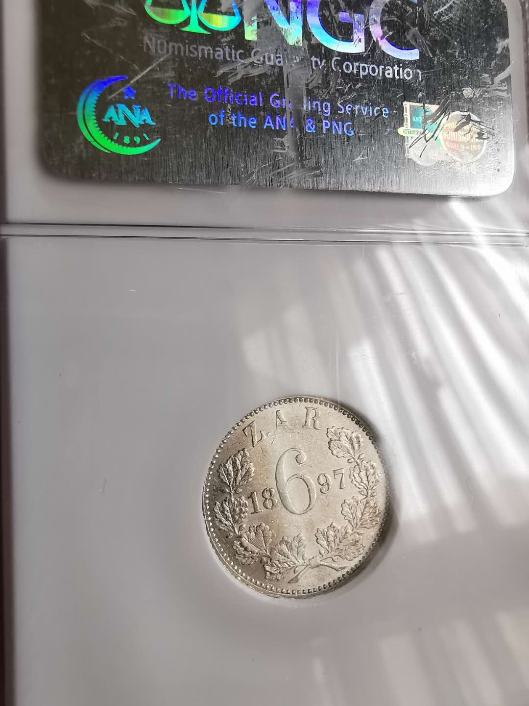 凡希社世界钱币微拍第一百三十期 1897南非克鲁格6便士NGC-AU58