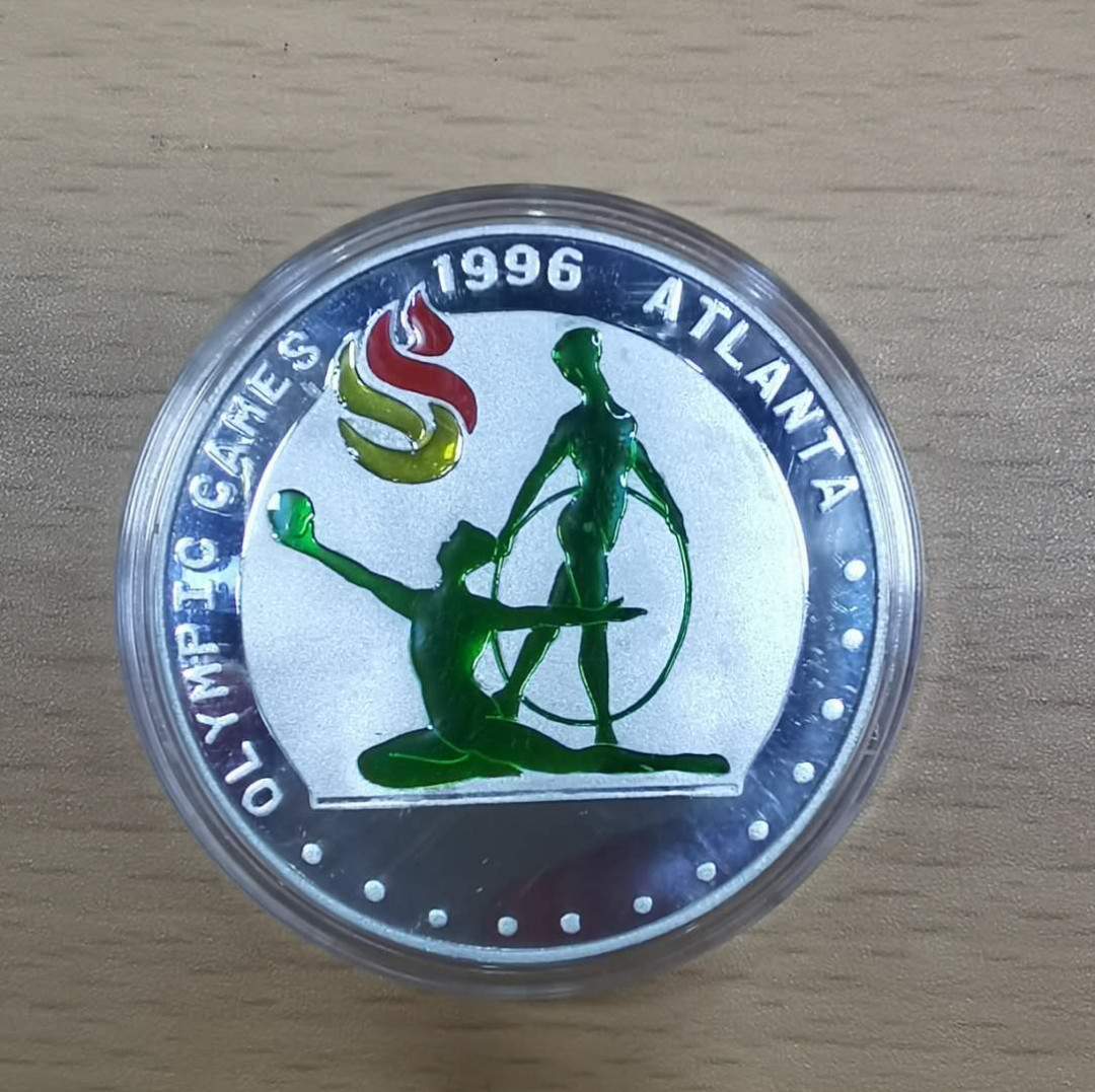 北京马甸外币专卖微拍第十九期，非贵金属纪念币流通币专场，陆续上新，敬请关注 2001年朝鲜中央厂发行纪念亚特兰大奥运会彩色铝币，品相如图