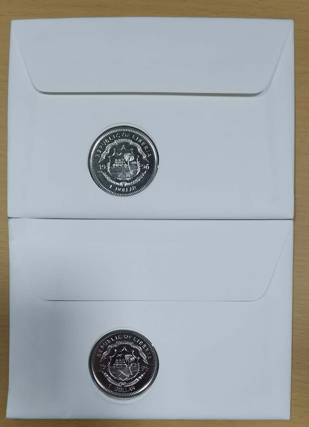 北京马甸外币专卖微拍第十九期，非贵金属纪念币流通币专场，陆续上新，敬请关注 1976年利比里亚纪念毛泽东逝世20周年邮票钱币封2枚/套。品相如图