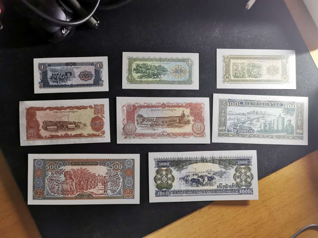 【鲸贝乐淘】千字文·第“交友投分，切磨箴规”号拍卖 【老挝🇱🇦 】1979~2003年全套8张，全新全品UNC 