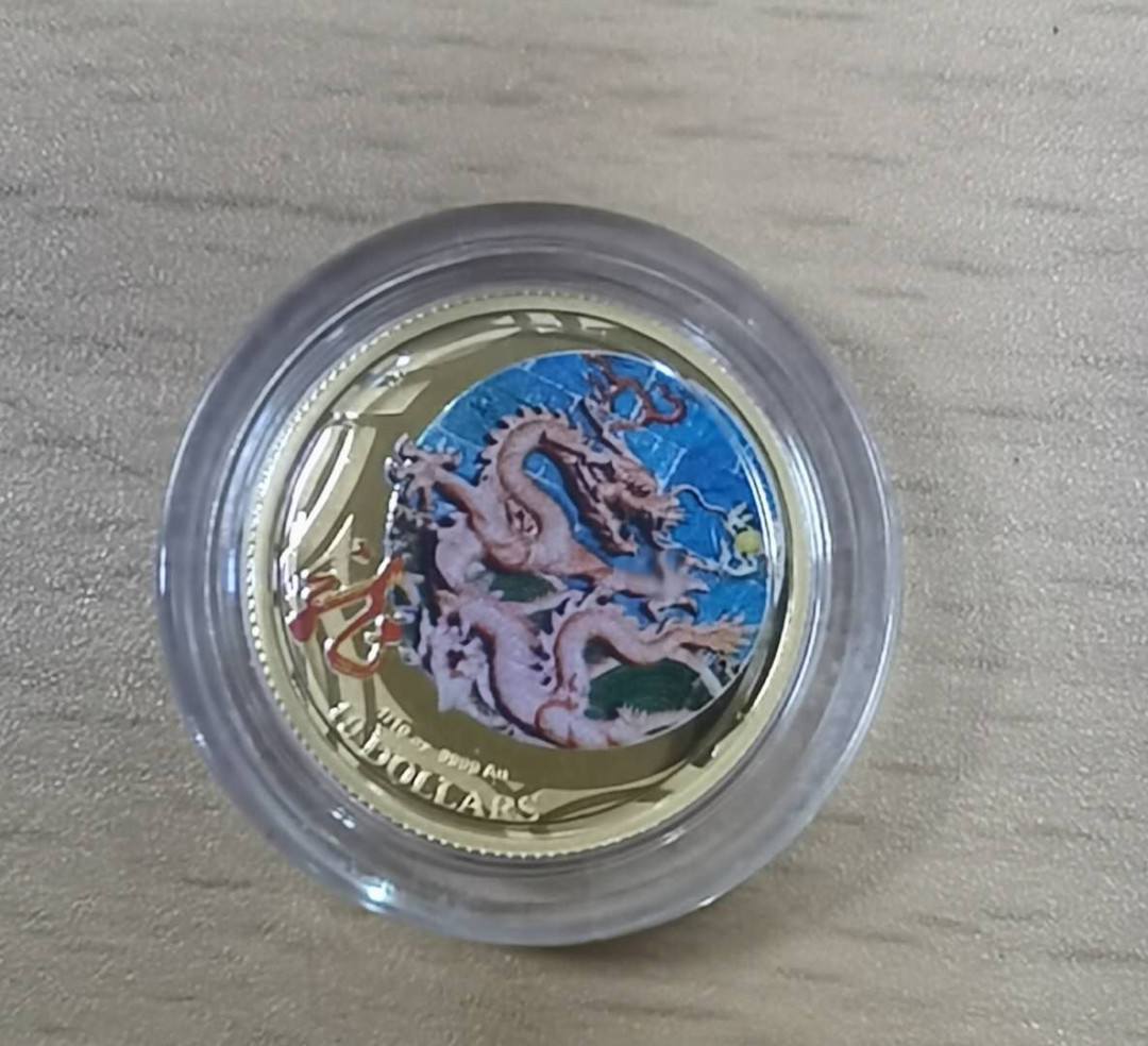 北京马甸外币专卖微拍第二十一期，陆续上新，欢迎关注 2012年澳大利亚彩色生肖龙金币，重：1/10盎司。成色999，品相如图