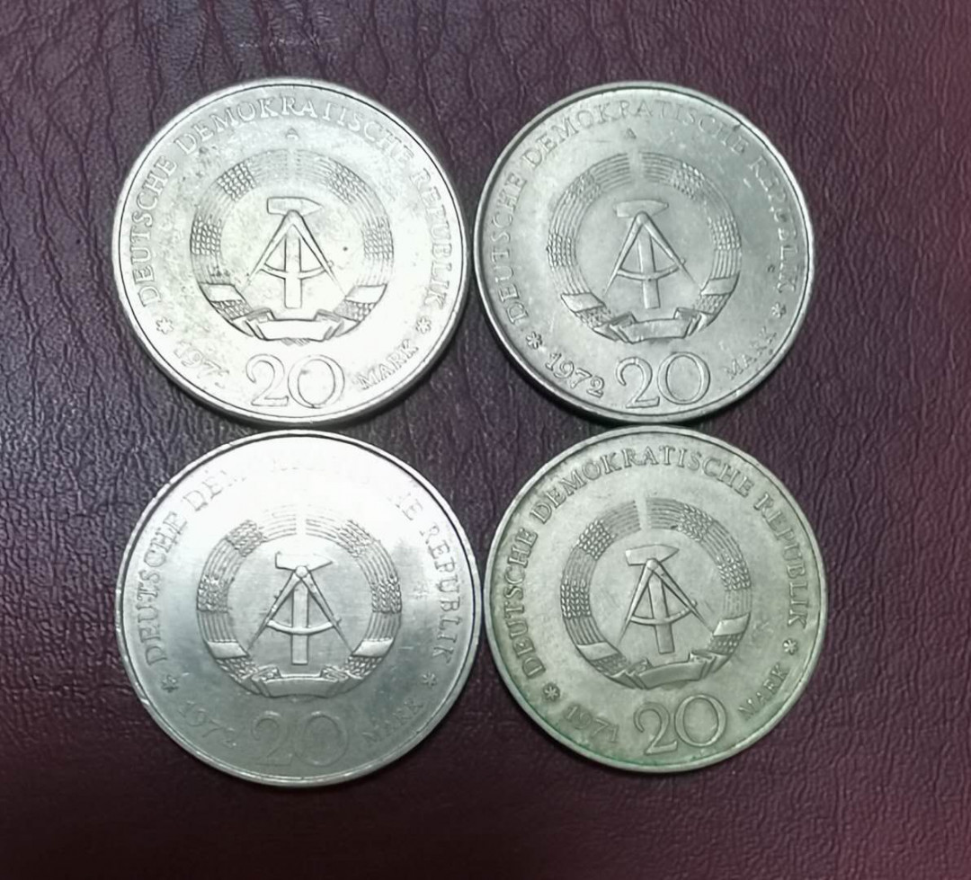 北京马甸外币专卖微拍第二十二期，非贵金属纪念币，流通币专场。陆续上新，欢迎关注陆续上新 东德20马克纪念币4枚，品相如图
