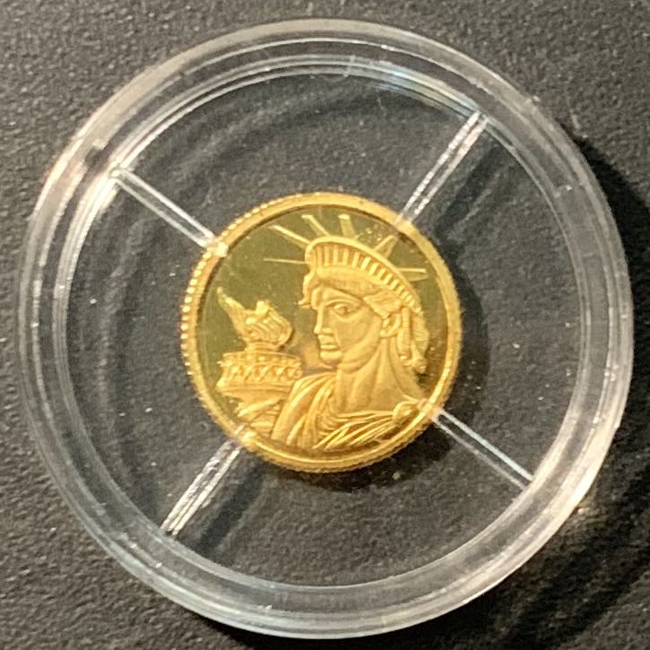 紫瑗钱币——微拍第103期 安道尔 2010年 自由女神像 1第纳尔 0.5克 0.585金 带证书 精制