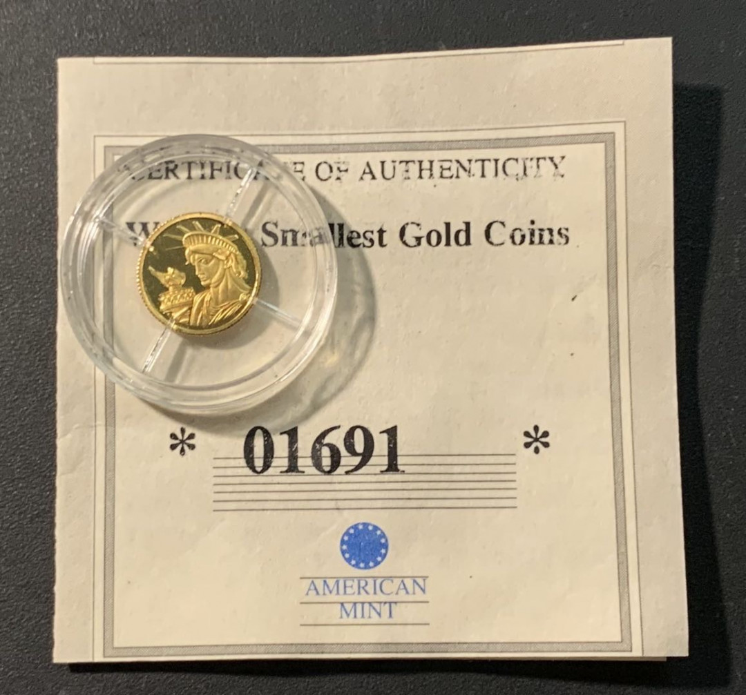 紫瑗钱币——微拍第103期 安道尔 2010年 自由女神像 1第纳尔 0.5克 0.585金 带证书 精制